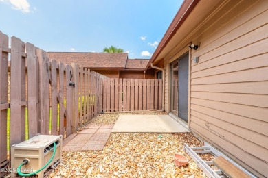 Discover this beautifully maintained 3-bed, 2-bath canal front on The Club At Pelican Bay - North Course in Florida - for sale on GolfHomes.com, golf home, golf lot