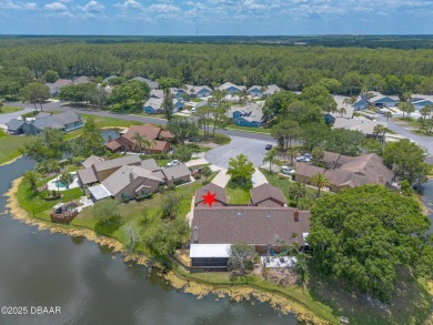 Discover this beautifully maintained 3-bed, 2-bath canal front on The Club At Pelican Bay - North Course in Florida - for sale on GolfHomes.com, golf home, golf lot