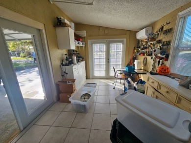 This spacious 2-bedroom, 2 bath, 2 den home is massive and a on Big Cypress Golf and Country Club in Florida - for sale on GolfHomes.com, golf home, golf lot