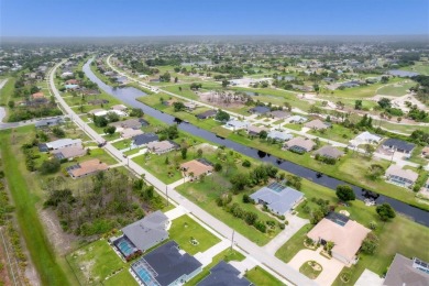 PRIVACY ABOUNDS with this immaculate custom Schroeder-built home on Pinemoor West Golf Club in Florida - for sale on GolfHomes.com, golf home, golf lot