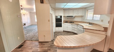 Located in a prime setting with impressive mountain vistas, this on Palm Desert Greens Country Club in California - for sale on GolfHomes.com, golf home, golf lot