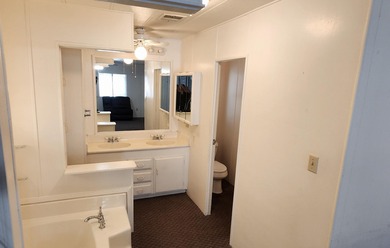 Located in a prime setting with impressive mountain vistas, this on Palm Desert Greens Country Club in California - for sale on GolfHomes.com, golf home, golf lot