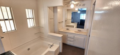 Located in a prime setting with impressive mountain vistas, this on Palm Desert Greens Country Club in California - for sale on GolfHomes.com, golf home, golf lot