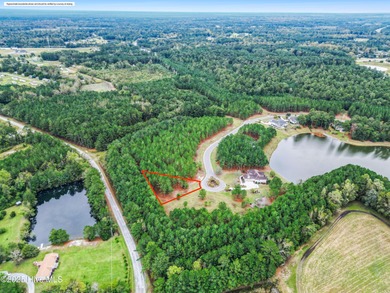 This 0.48-acre lot sits at the end of a cul-de-sac in The on River Landing Golf Course in North Carolina - for sale on GolfHomes.com, golf home, golf lot