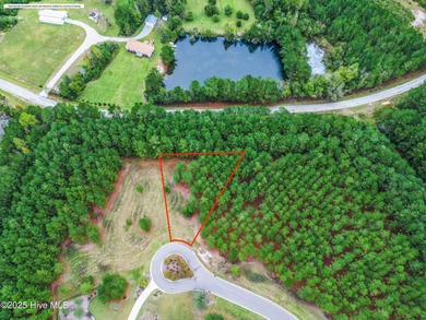 This 0.48-acre lot sits at the end of a cul-de-sac in The on River Landing Golf Course in North Carolina - for sale on GolfHomes.com, golf home, golf lot