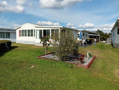 Beautiful open-concept & extremely well-maintained home in a on Four Lakes Golf Club in Florida - for sale on GolfHomes.com, golf home, golf lot