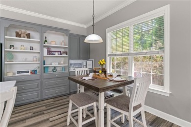 Tucked behind a canopy of mature trees, this beautifully on Oak Grove Island Golf and Country Club in Georgia - for sale on GolfHomes.com, golf home, golf lot