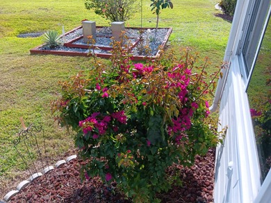 Beautiful open-concept & extremely well-maintained home in a on Four Lakes Golf Club in Florida - for sale on GolfHomes.com, golf home, golf lot