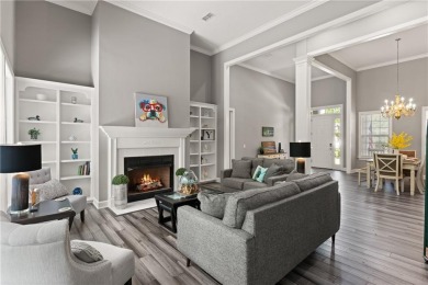 Tucked behind a canopy of mature trees, this beautifully on Oak Grove Island Golf and Country Club in Georgia - for sale on GolfHomes.com, golf home, golf lot