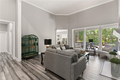Tucked behind a canopy of mature trees, this beautifully on Oak Grove Island Golf and Country Club in Georgia - for sale on GolfHomes.com, golf home, golf lot