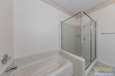 Charming three bedroom, two bath Villa conveniently located on a on South Padre Island Golf Club in Texas - for sale on GolfHomes.com, golf home, golf lot
