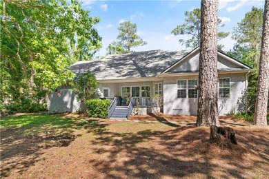 Tucked behind a canopy of mature trees, this beautifully on Oak Grove Island Golf and Country Club in Georgia - for sale on GolfHomes.com, golf home, golf lot