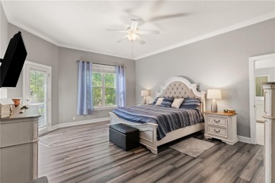 Tucked behind a canopy of mature trees, this beautifully on Oak Grove Island Golf and Country Club in Georgia - for sale on GolfHomes.com, golf home, golf lot