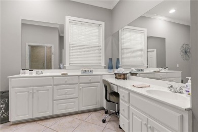 Tucked behind a canopy of mature trees, this beautifully on Oak Grove Island Golf and Country Club in Georgia - for sale on GolfHomes.com, golf home, golf lot