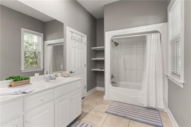 Tucked behind a canopy of mature trees, this beautifully on Oak Grove Island Golf and Country Club in Georgia - for sale on GolfHomes.com, golf home, golf lot