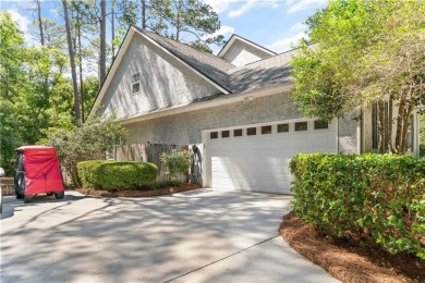 Tucked behind a canopy of mature trees, this beautifully on Oak Grove Island Golf and Country Club in Georgia - for sale on GolfHomes.com, golf home, golf lot