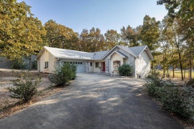 Single-level home with a scenic view of Coronado Golf Course 8th on Coronado Golf Course in Arkansas - for sale on GolfHomes.com, golf home, golf lot