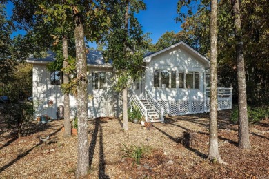 Single-level home with a scenic view of Coronado Golf Course 8th on Coronado Golf Course in Arkansas - for sale on GolfHomes.com, golf home, golf lot