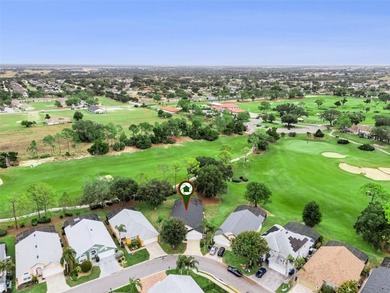 Located in the desirable golfing community of Southern Dunes on Southern Dunes Golf and Country Club in Florida - for sale on GolfHomes.com, golf home, golf lot