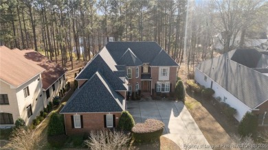 Fabulous three story home with a golf course and water (pond) on Anderson Creek Golf Club in North Carolina - for sale on GolfHomes.com, golf home, golf lot