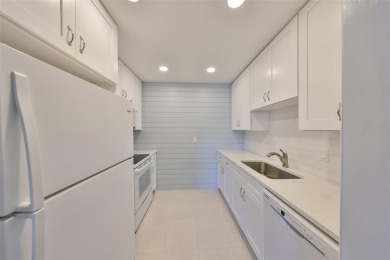 One or more photo(s) has been virtually staged. UPDATED AND on Kings Point Executive Golf Course in Florida - for sale on GolfHomes.com, golf home, golf lot