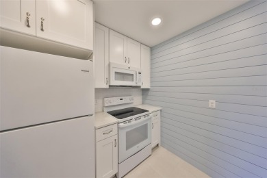 One or more photo(s) has been virtually staged. UPDATED AND on Kings Point Executive Golf Course in Florida - for sale on GolfHomes.com, golf home, golf lot
