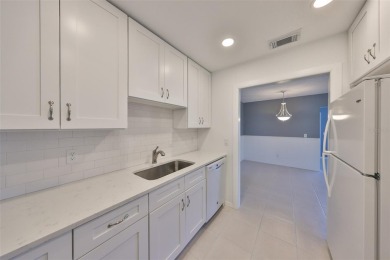 One or more photo(s) has been virtually staged. UPDATED AND on Kings Point Executive Golf Course in Florida - for sale on GolfHomes.com, golf home, golf lot