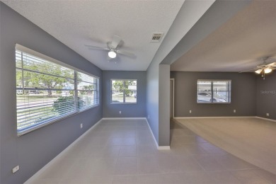 One or more photo(s) has been virtually staged. UPDATED AND on Kings Point Executive Golf Course in Florida - for sale on GolfHomes.com, golf home, golf lot