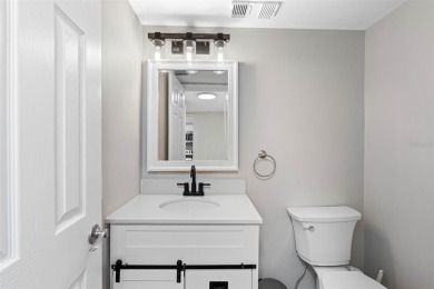 YOUR PARADISE HOME OR AN INVESTOR'S DREAM - REMODELED 1BR/1.5BA on Isla Del Sol Yacht and Country Club in Florida - for sale on GolfHomes.com, golf home, golf lot