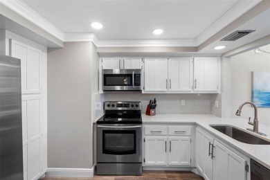 YOUR PARADISE HOME OR AN INVESTOR'S DREAM - REMODELED 1BR/1.5BA on Isla Del Sol Yacht and Country Club in Florida - for sale on GolfHomes.com, golf home, golf lot