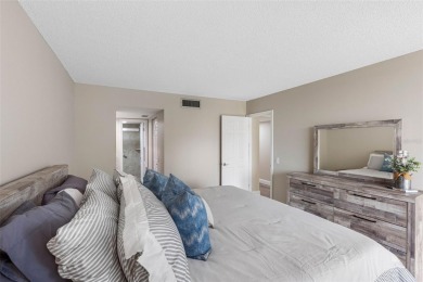 YOUR PARADISE HOME OR AN INVESTOR'S DREAM - REMODELED 1BR/1.5BA on Isla Del Sol Yacht and Country Club in Florida - for sale on GolfHomes.com, golf home, golf lot