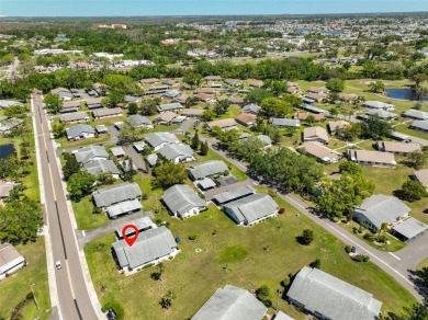 One or more photo(s) has been virtually staged. UPDATED AND on Kings Point Executive Golf Course in Florida - for sale on GolfHomes.com, golf home, golf lot