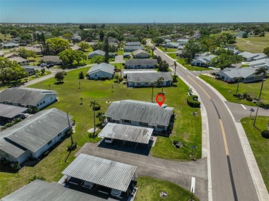 One or more photo(s) has been virtually staged. UPDATED AND on Kings Point Executive Golf Course in Florida - for sale on GolfHomes.com, golf home, golf lot