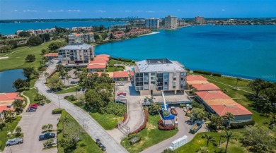YOUR PARADISE HOME OR AN INVESTOR'S DREAM - REMODELED 1BR/1.5BA on Isla Del Sol Yacht and Country Club in Florida - for sale on GolfHomes.com, golf home, golf lot