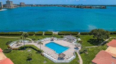 YOUR PARADISE HOME OR AN INVESTOR'S DREAM - REMODELED 1BR/1.5BA on Isla Del Sol Yacht and Country Club in Florida - for sale on GolfHomes.com, golf home, golf lot