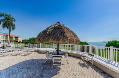 YOUR PARADISE HOME OR AN INVESTOR'S DREAM - REMODELED 1BR/1.5BA on Isla Del Sol Yacht and Country Club in Florida - for sale on GolfHomes.com, golf home, golf lot