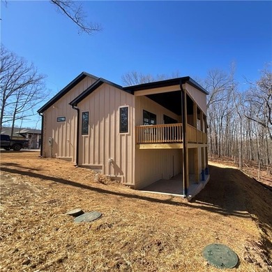 Experience modern living in this beautifully crafted new on Bella Vista - Metfield Golf Complex and Country Club in Arkansas - for sale on GolfHomes.com, golf home, golf lot