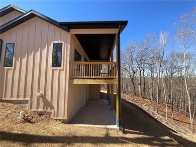 Experience modern living in this beautifully crafted new on Bella Vista - Metfield Golf Complex and Country Club in Arkansas - for sale on GolfHomes.com, golf home, golf lot