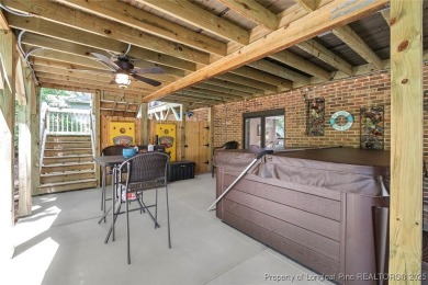 This stunning 4,000-square-foot brick ranch offers a rare blend on Carolina Trace Country Club in North Carolina - for sale on GolfHomes.com, golf home, golf lot
