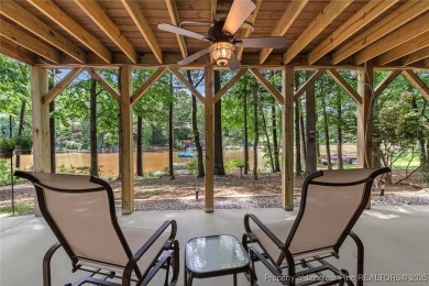 This stunning 4,000-square-foot brick ranch offers a rare blend on Carolina Trace Country Club in North Carolina - for sale on GolfHomes.com, golf home, golf lot