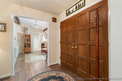 This stunning 4,000-square-foot brick ranch offers a rare blend on Carolina Trace Country Club in North Carolina - for sale on GolfHomes.com, golf home, golf lot