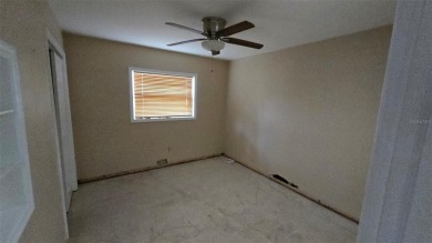 This home is located in Dana Shores - a very popular waterfront on Rocky Point Golf Course in Florida - for sale on GolfHomes.com, golf home, golf lot