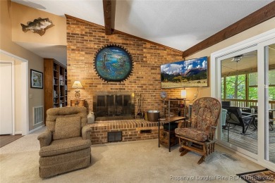 This stunning 4,000-square-foot brick ranch offers a rare blend on Carolina Trace Country Club in North Carolina - for sale on GolfHomes.com, golf home, golf lot