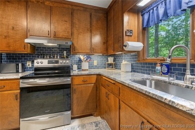 This stunning 4,000-square-foot brick ranch offers a rare blend on Carolina Trace Country Club in North Carolina - for sale on GolfHomes.com, golf home, golf lot