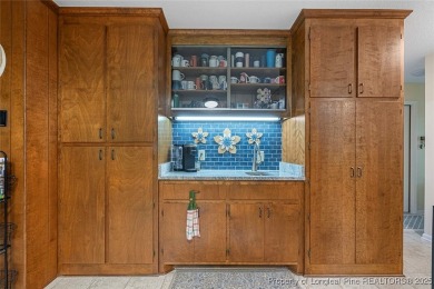 This stunning 4,000-square-foot brick ranch offers a rare blend on Carolina Trace Country Club in North Carolina - for sale on GolfHomes.com, golf home, golf lot