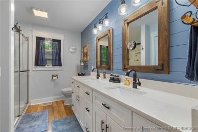This stunning 4,000-square-foot brick ranch offers a rare blend on Carolina Trace Country Club in North Carolina - for sale on GolfHomes.com, golf home, golf lot