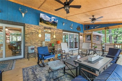 This stunning 4,000-square-foot brick ranch offers a rare blend on Carolina Trace Country Club in North Carolina - for sale on GolfHomes.com, golf home, golf lot