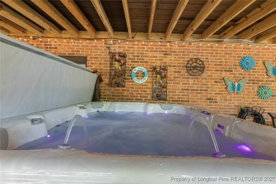 This stunning 4,000-square-foot brick ranch offers a rare blend on Carolina Trace Country Club in North Carolina - for sale on GolfHomes.com, golf home, golf lot