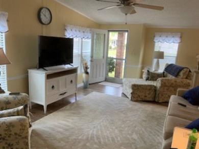 $85,000.00, Lot Rent $1,248.00. The HOA fee is $25.00 a year on Pine Lakes Country Club in Florida - for sale on GolfHomes.com, golf home, golf lot