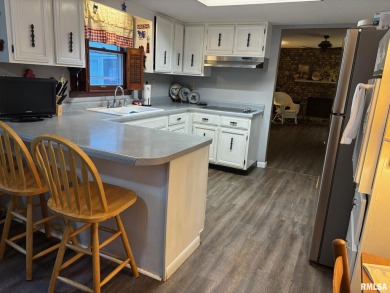 Homeowners have lived in this home for almost 40 years and on Edgewood Golf Course in Illinois - for sale on GolfHomes.com, golf home, golf lot